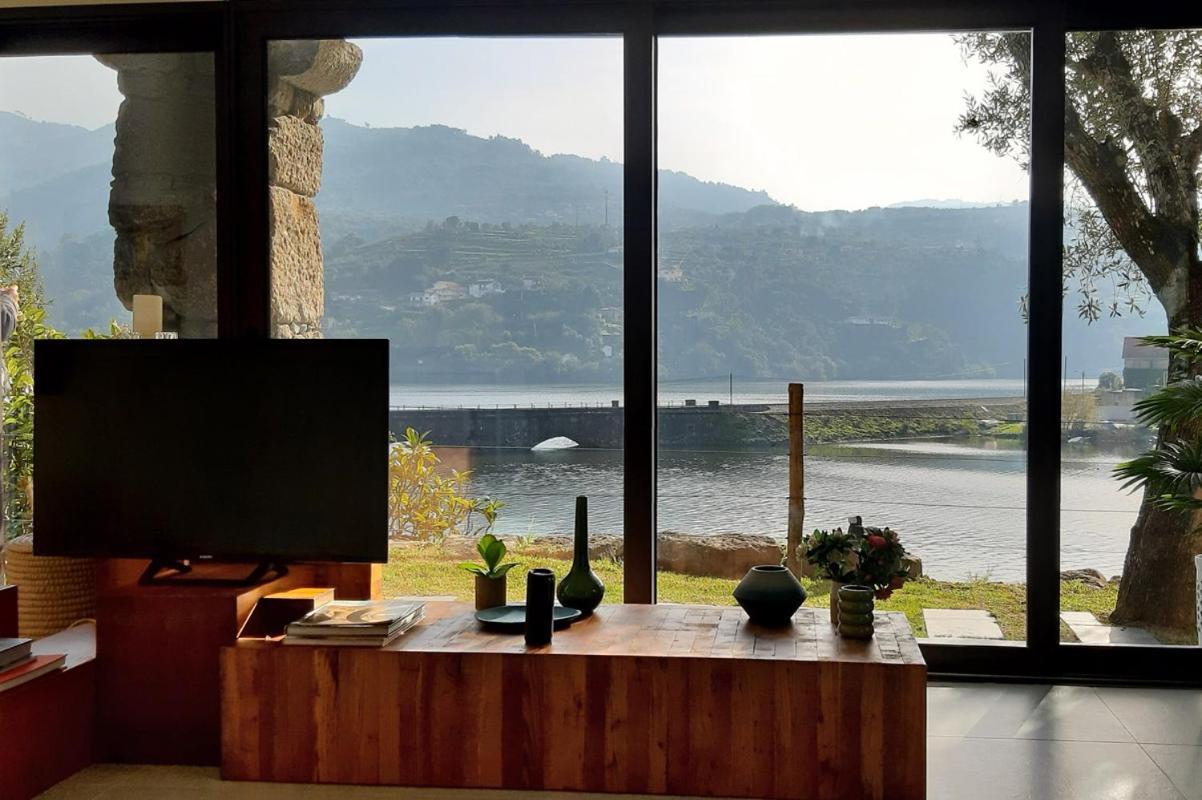 Casas De Pousadouro Baião Esterno foto